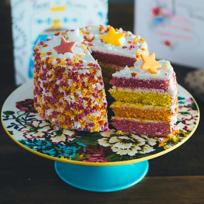 sliced cake on cake riser